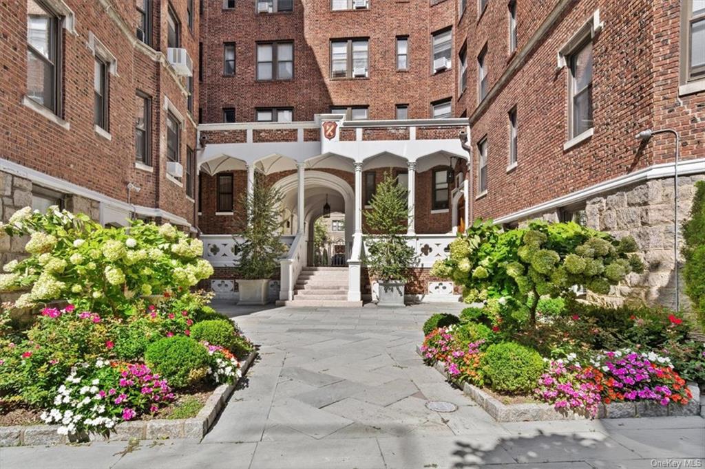 31 Pondfield Road, Unit 46 Bronxville, NY 10708 - Photo 12 of 15 a front view of a multi story residential apartment building