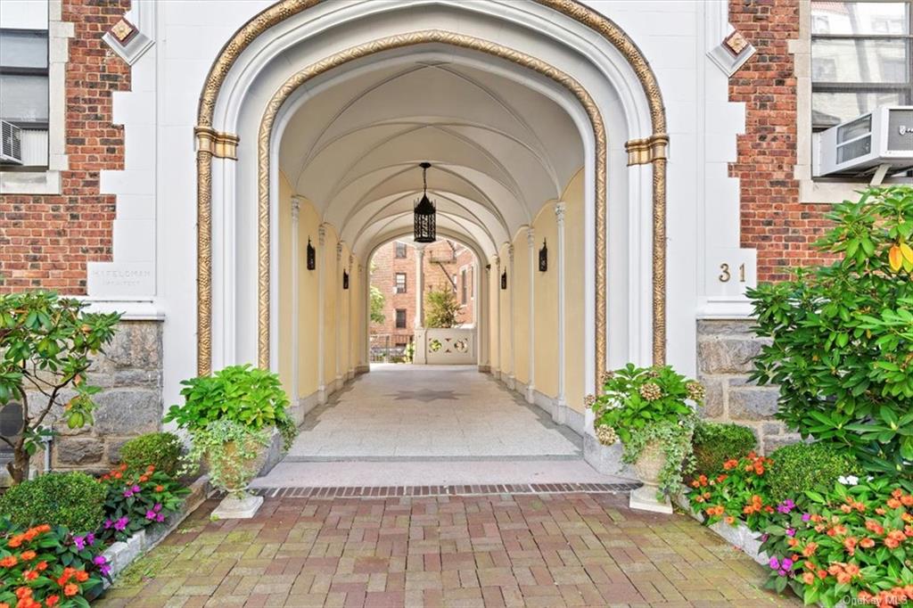31 Pondfield Road, Unit 46 Bronxville, NY 10708 - Photo 13 of 15 a front view of a house with a porch