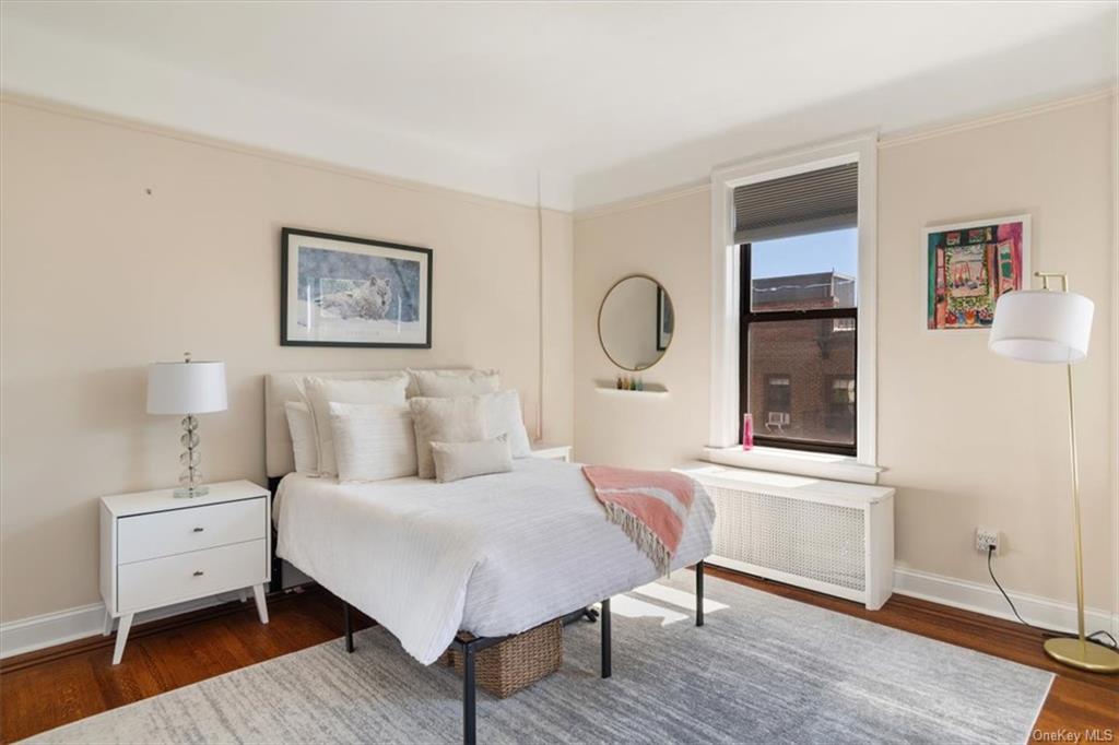 31 Pondfield Road, Unit 46 Bronxville, NY 10708 - Photo 3 of 15 a bed room with a bed and a window