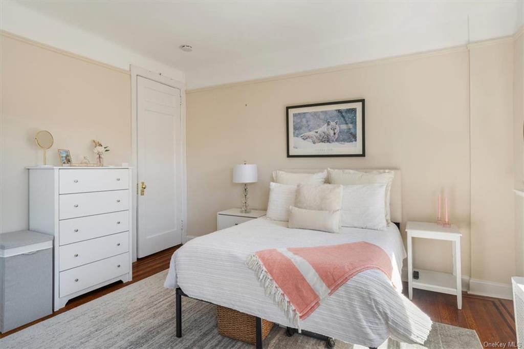 31 Pondfield Road, Unit 46 Bronxville, NY 10708 - Photo 4 of 15 a bedroom with a bed and a dresser