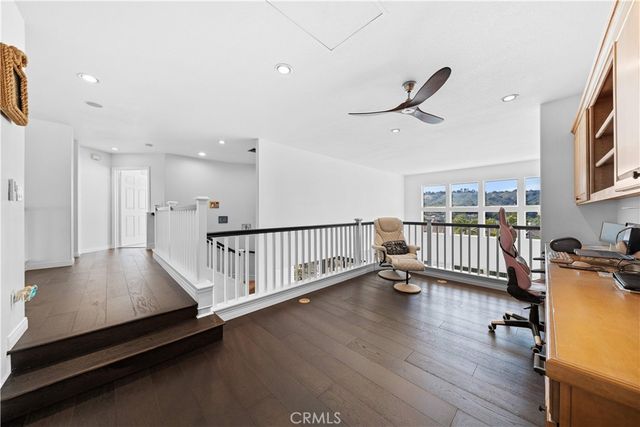 a kitchen with stainless steel appliances a stove a sink and a refrigerator