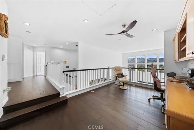 a kitchen with stainless steel appliances a stove a sink and a refrigerator