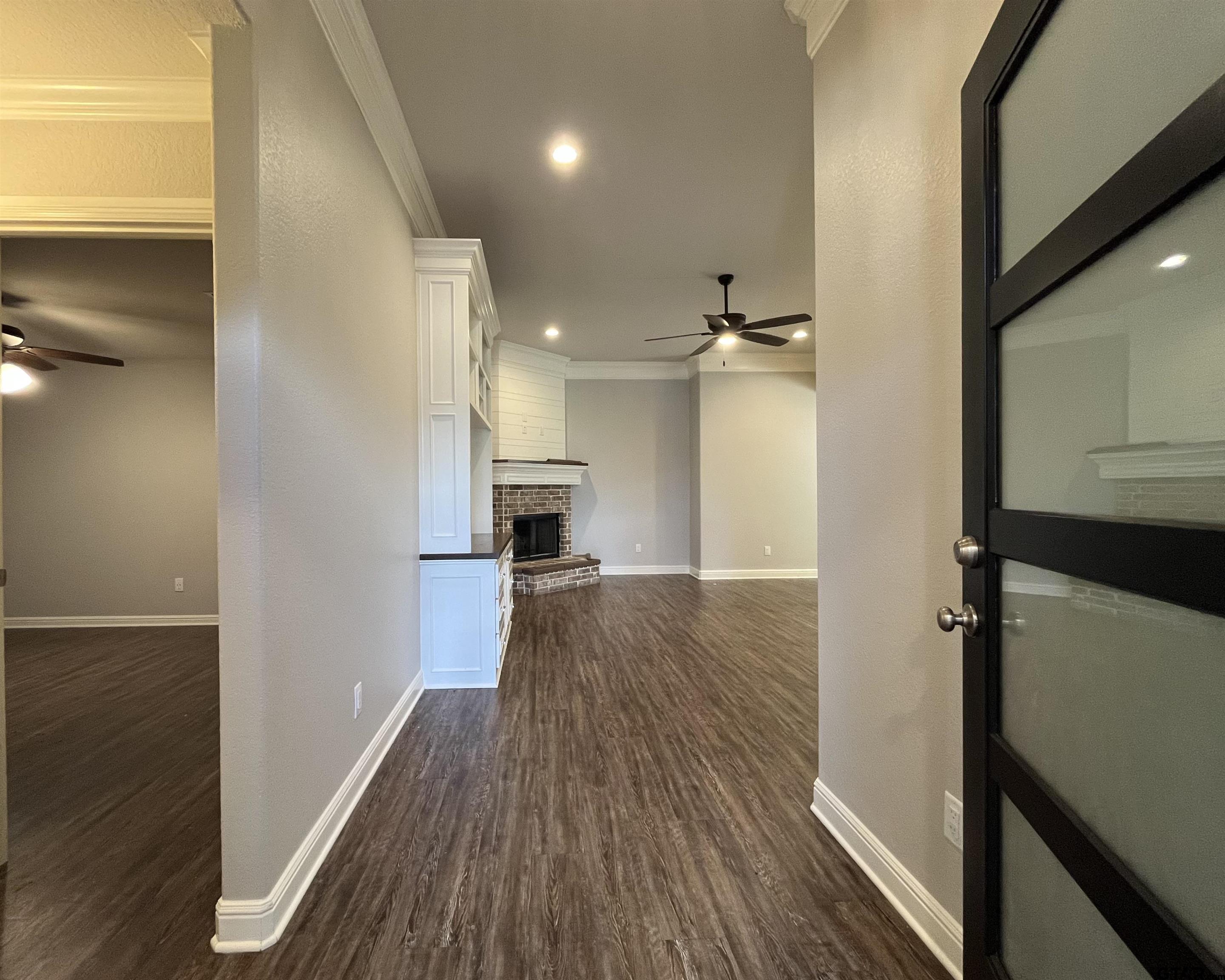 5429 Meadow Ridge Drive Flint, TX 75762 - Photo 2 of 24 a view of empty room with wooden floor