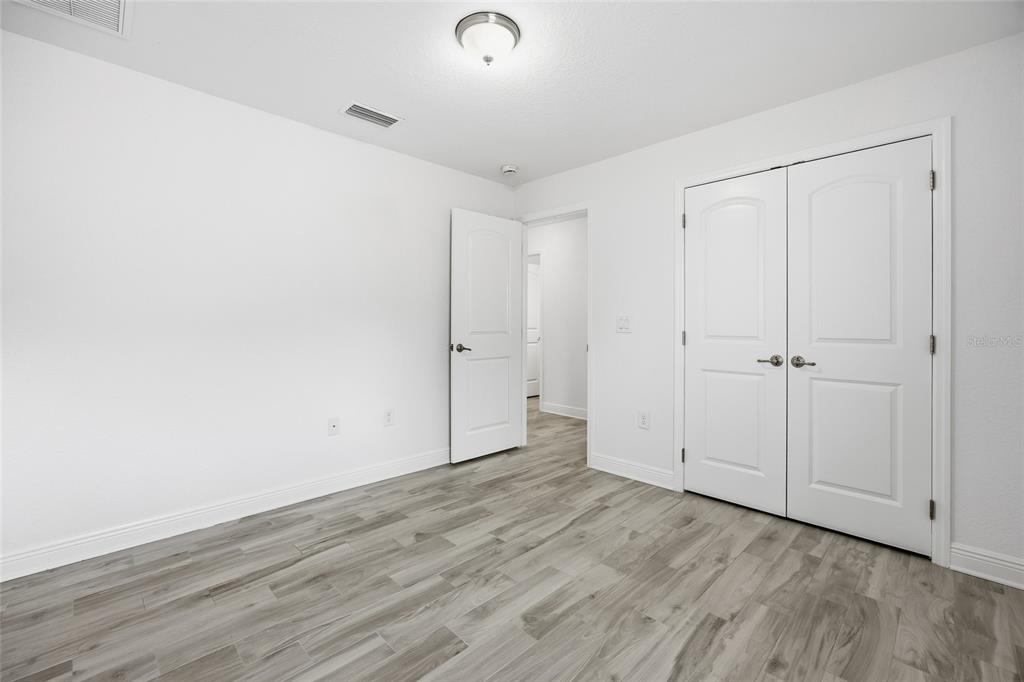 4863 Southwest 63rd Street Ocala, FL 34474 - Photo 27 of 41 a view of an empty room