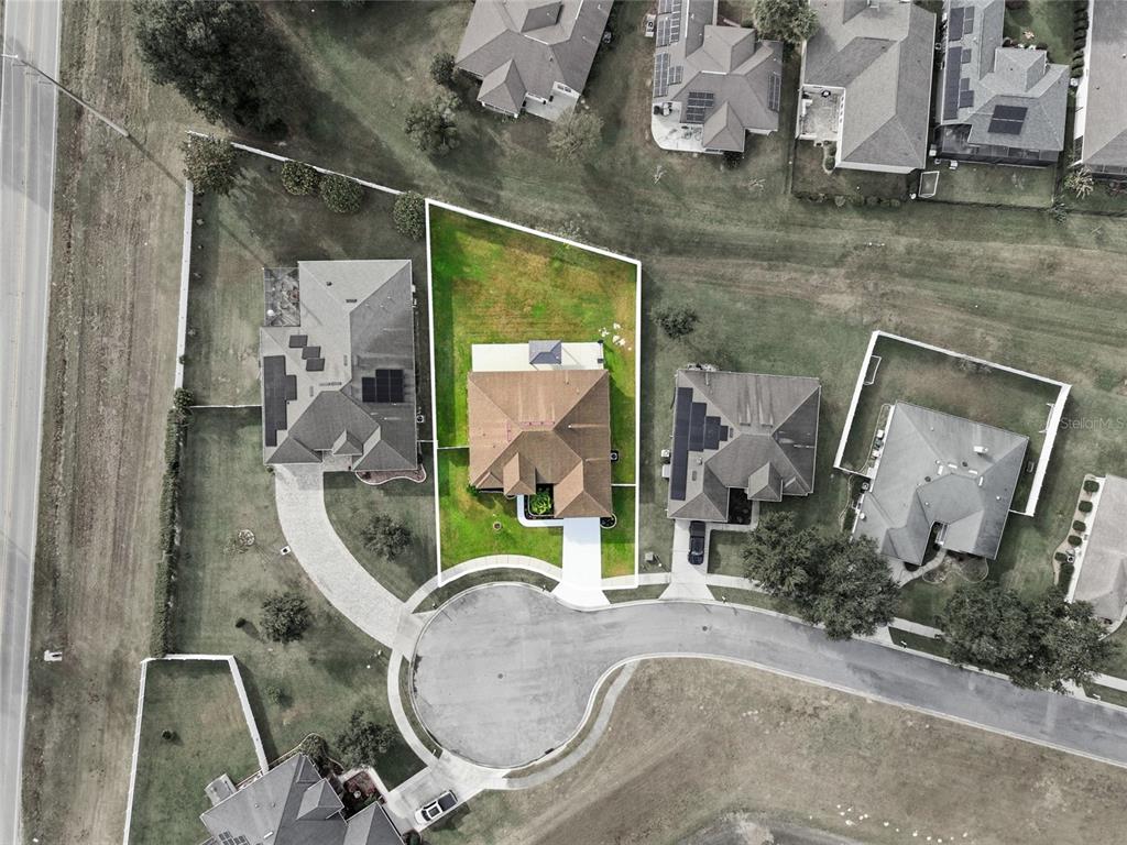 4863 Southwest 63rd Street Ocala, FL 34474 - Photo 38 of 41 an aerial view of a house with swimming pool and porch