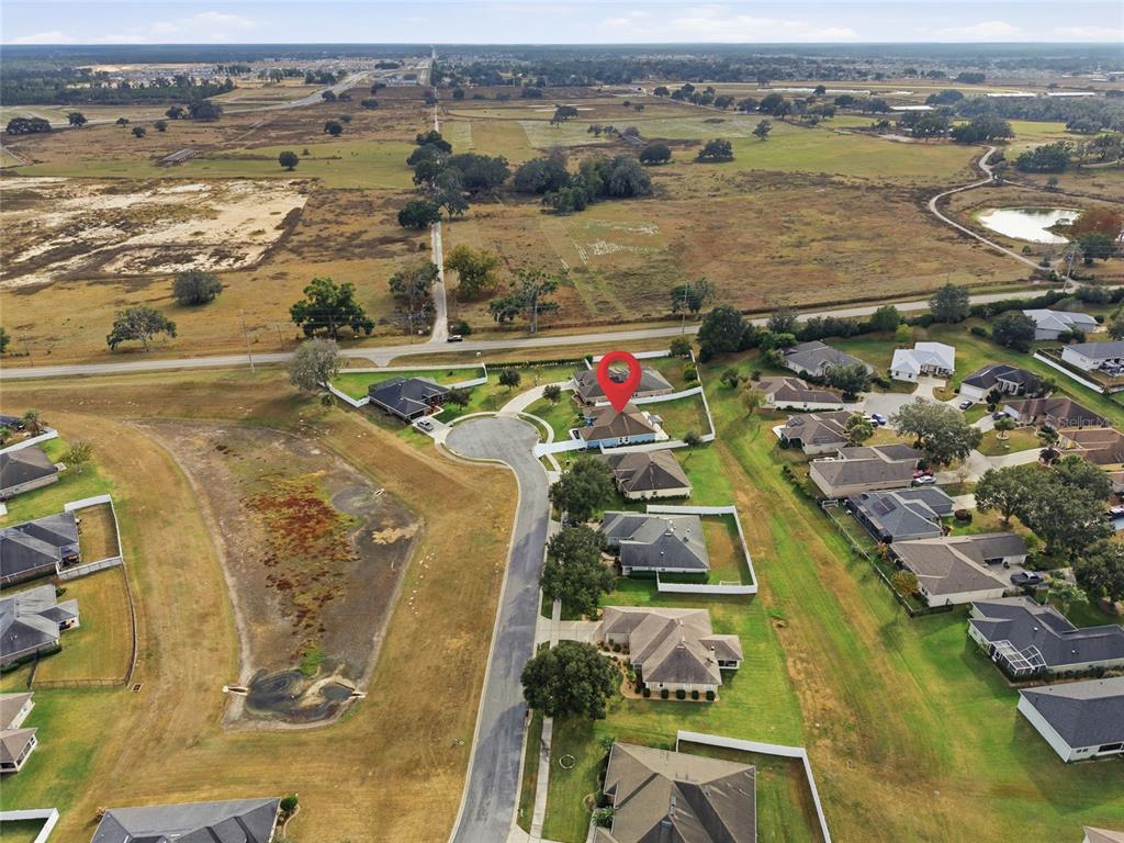 4863 Southwest 63rd Street Ocala, FL 34474 - Photo 40 of 41 an aerial view of residential houses with outdoor space