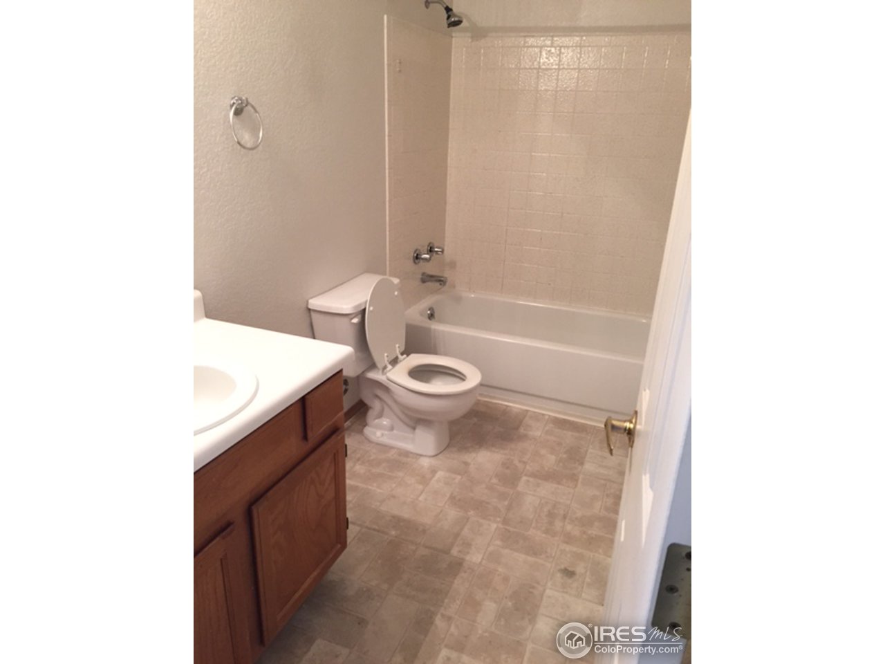 3335 Apollo Court Fort Collins, CO 80526 - Photo 7 of 10 a bathroom with a sink a toilet and shower