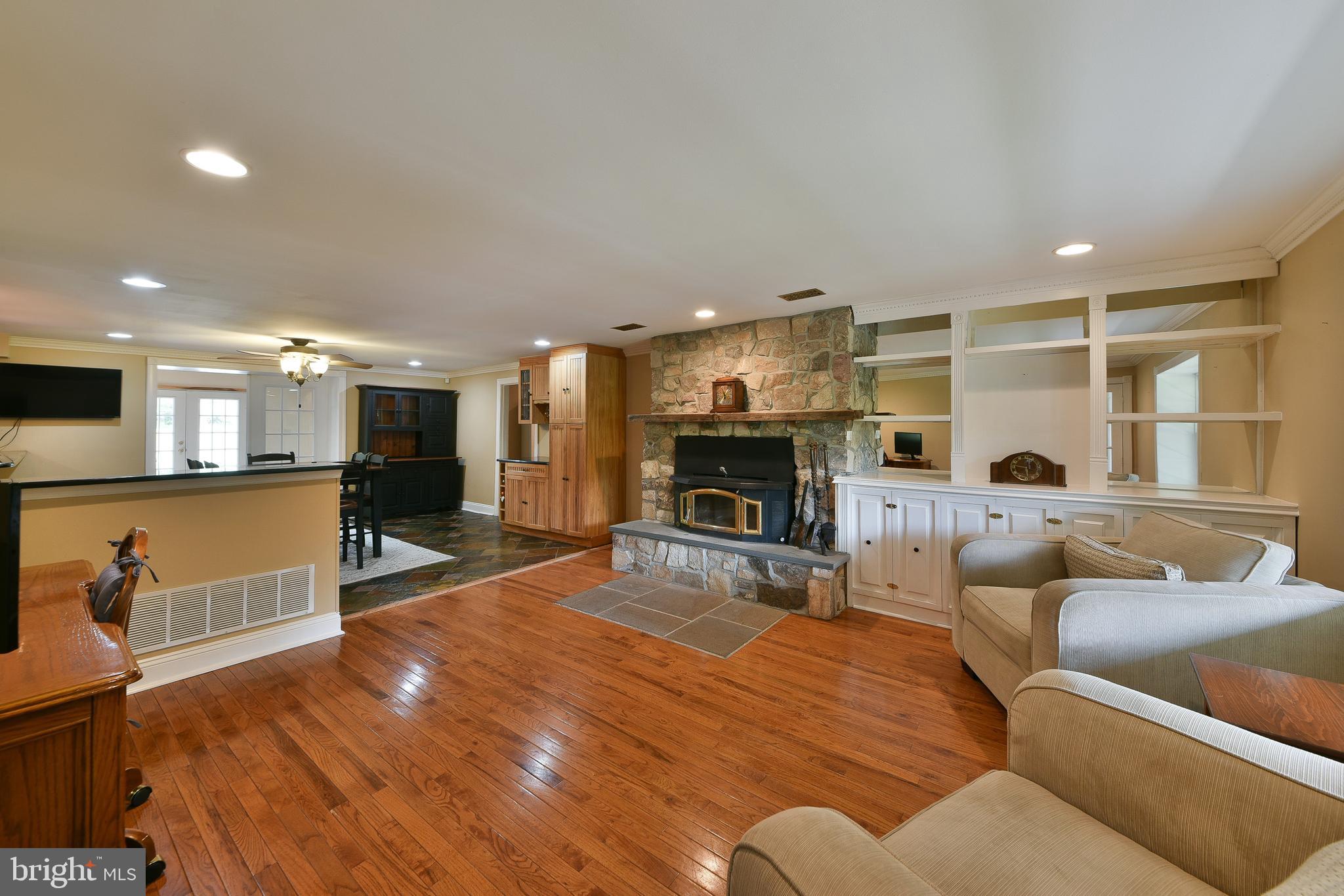 715 Bucks Road Perkasie, PA 18944 - Photo 28 of 55 Kitchen Sitting Room with Stone Fireplace