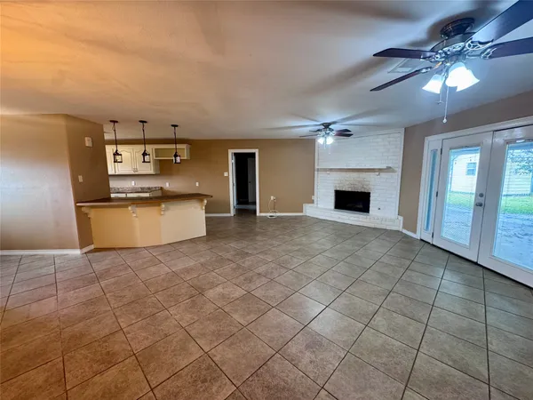 a view of a kitchen with furniture and a kitchen