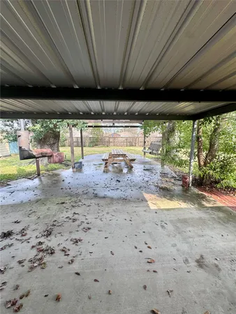 a view of a empty room with a large window