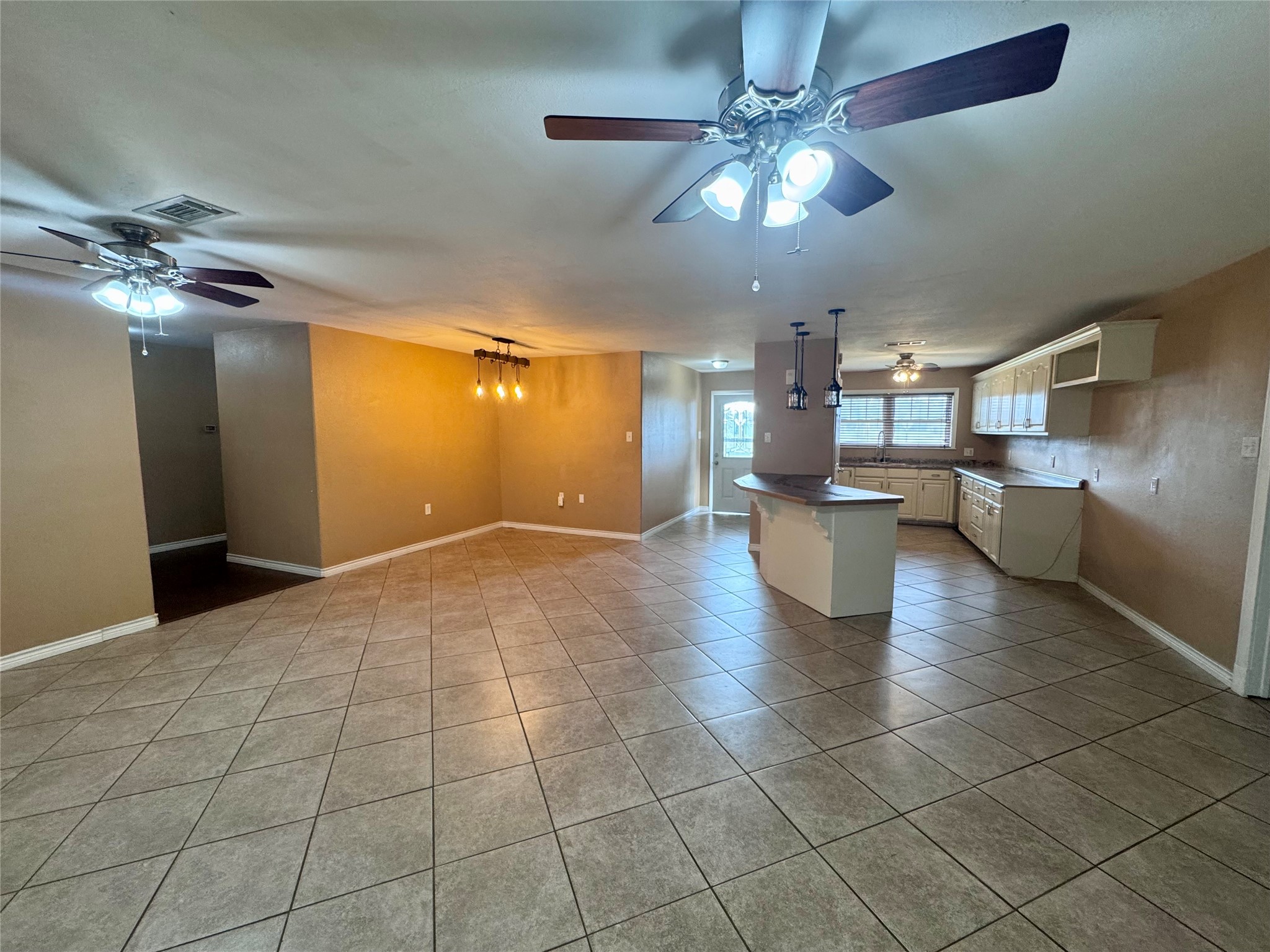 345 Rachal Avenue Bridge City, TX 77611 - Photo 4 of 25 a view of a livingroom with a kitchen