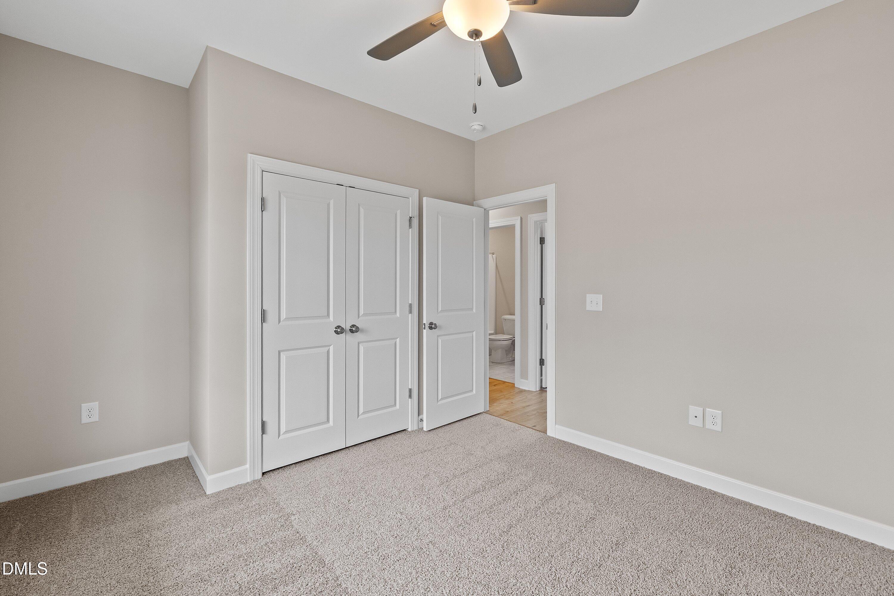 926 Micro Road West Selma, NC 27576 - Photo 30 of 41 an empty room with a ceiling fan