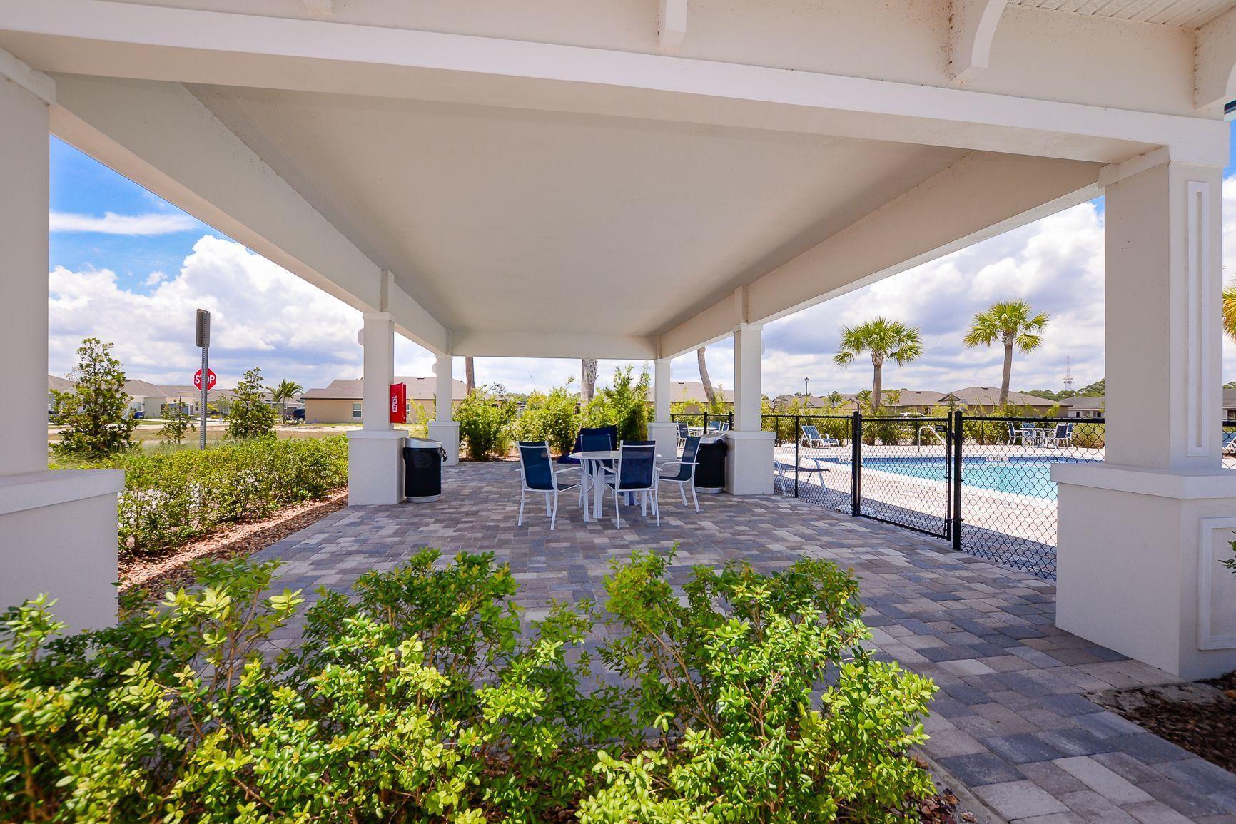 1618 Merriment Way Fort Pierce, FL 34947 - Photo 26 of 32 Covered Pool Area