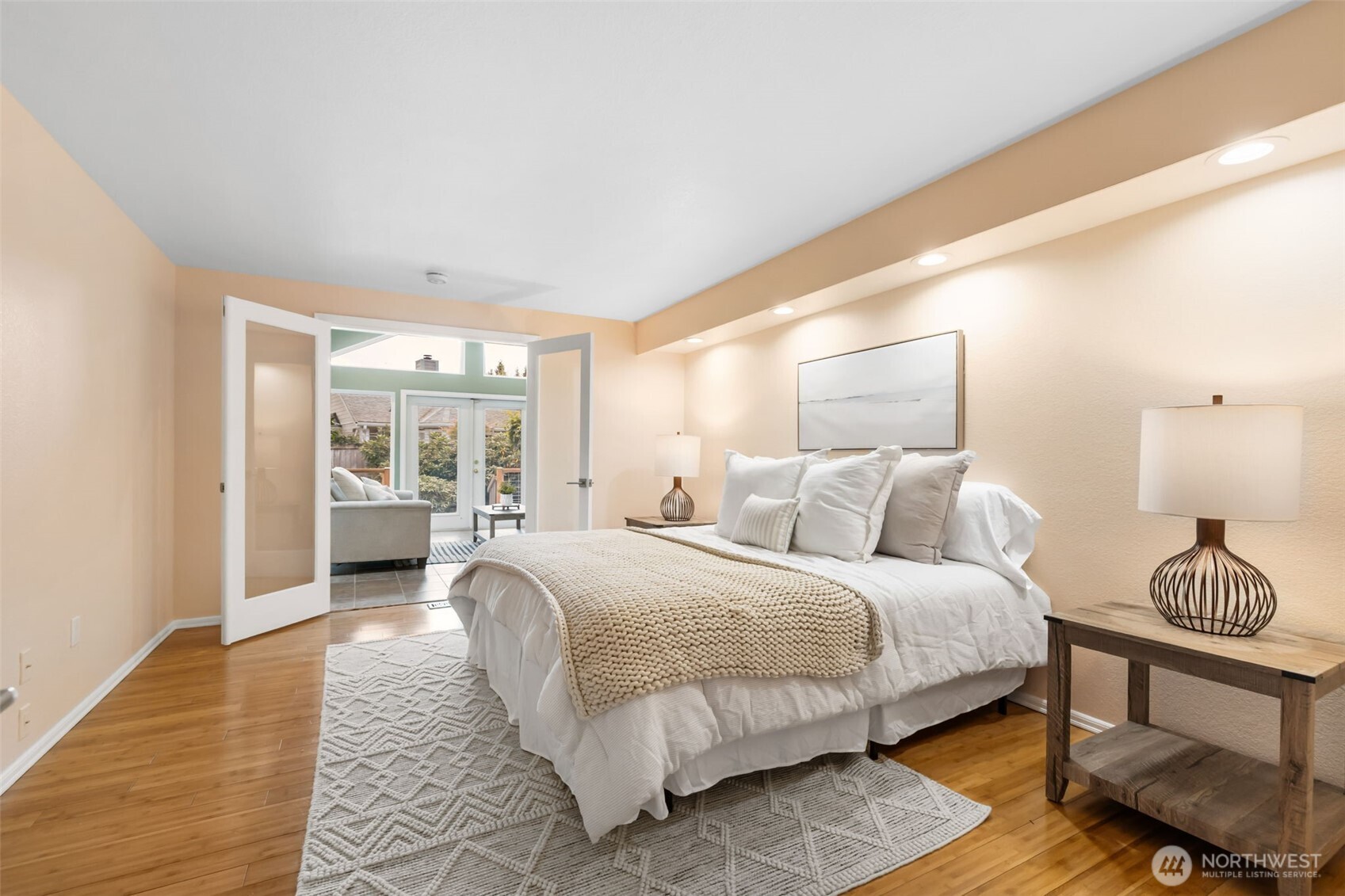 9220 78th Street Southwest Lakewood, WA 98498 - Photo 14 of 40 a bedroom with a large bed and a window