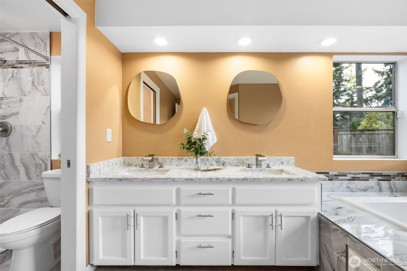 9220 78th Street Southwest Lakewood, WA 98498 - Photo 17 of 40 a bathroom with a granite countertop double vanity sink and a mirror