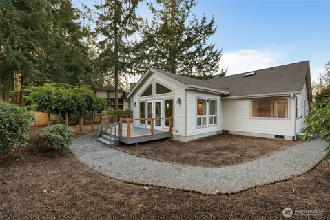 a view of a house with a sink and yard