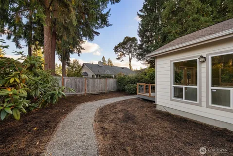a backyard of a house with lots of green space