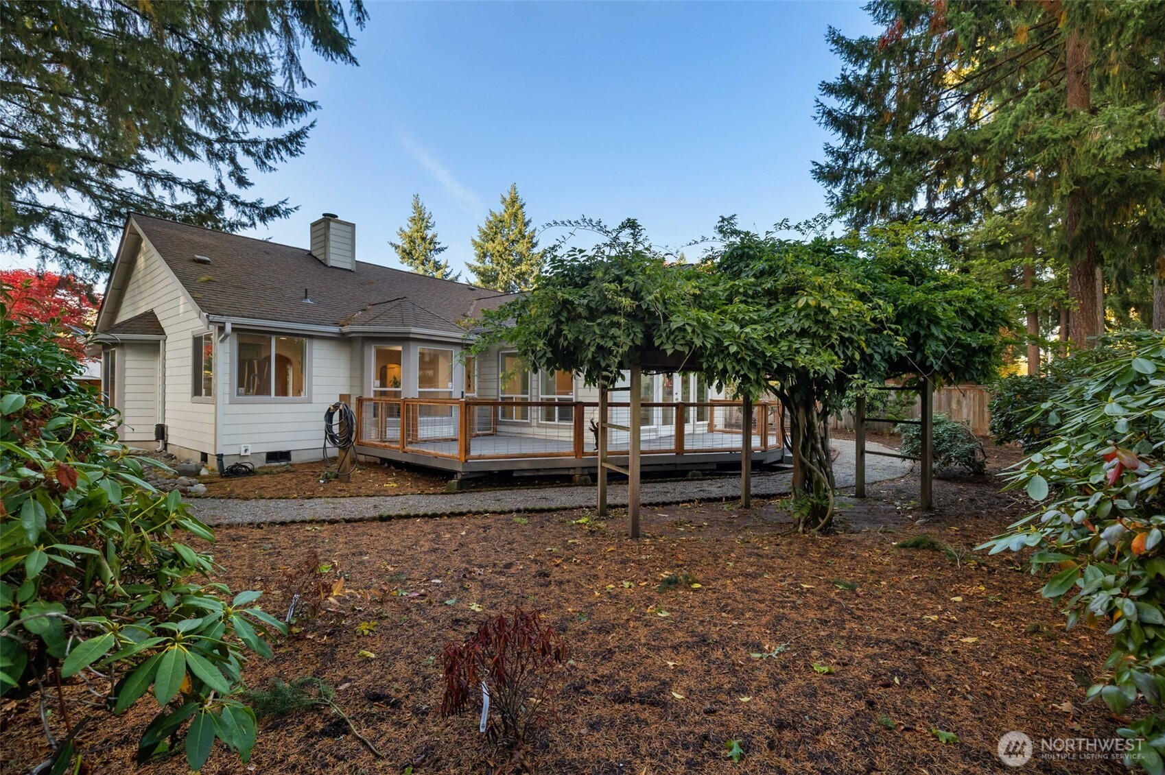 9220 78th Street Southwest Lakewood, WA 98498 - Photo 34 of 40 a view of a house with a yard