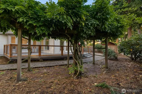a backyard of a house with lots of green space