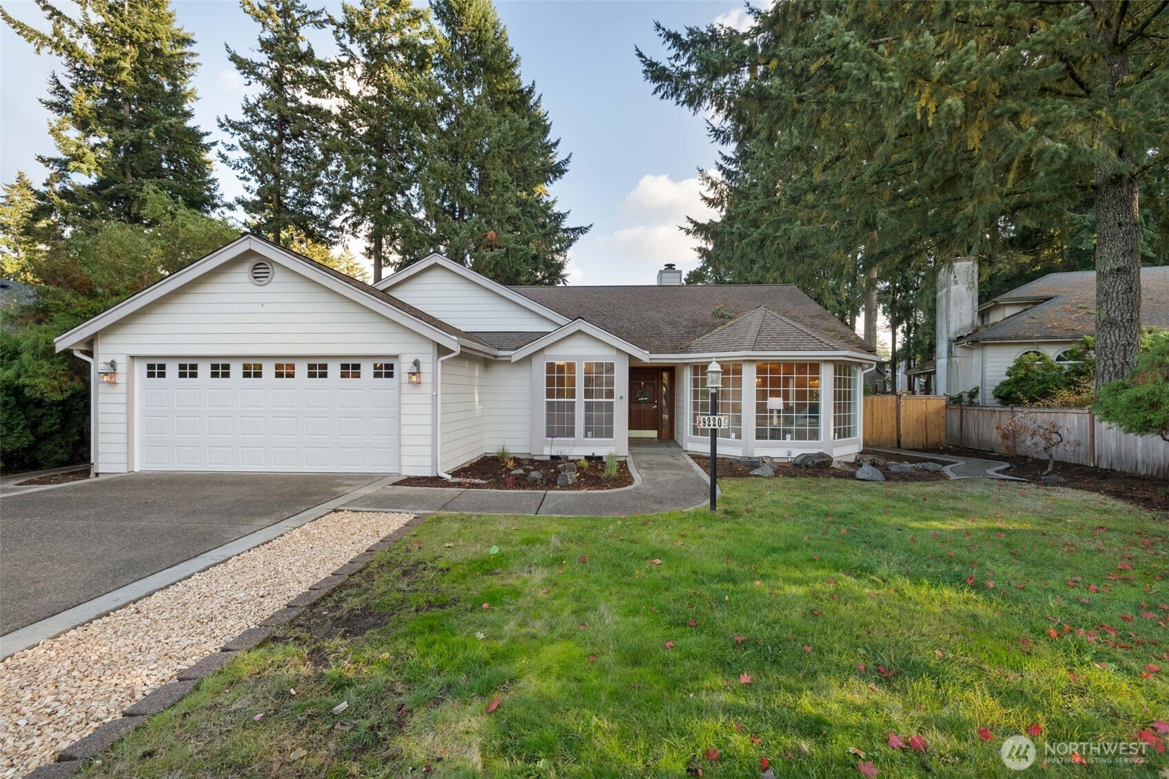 9220 78th Street Southwest Lakewood, WA 98498 - Photo 39 of 40 a front view of a house with yard and green space