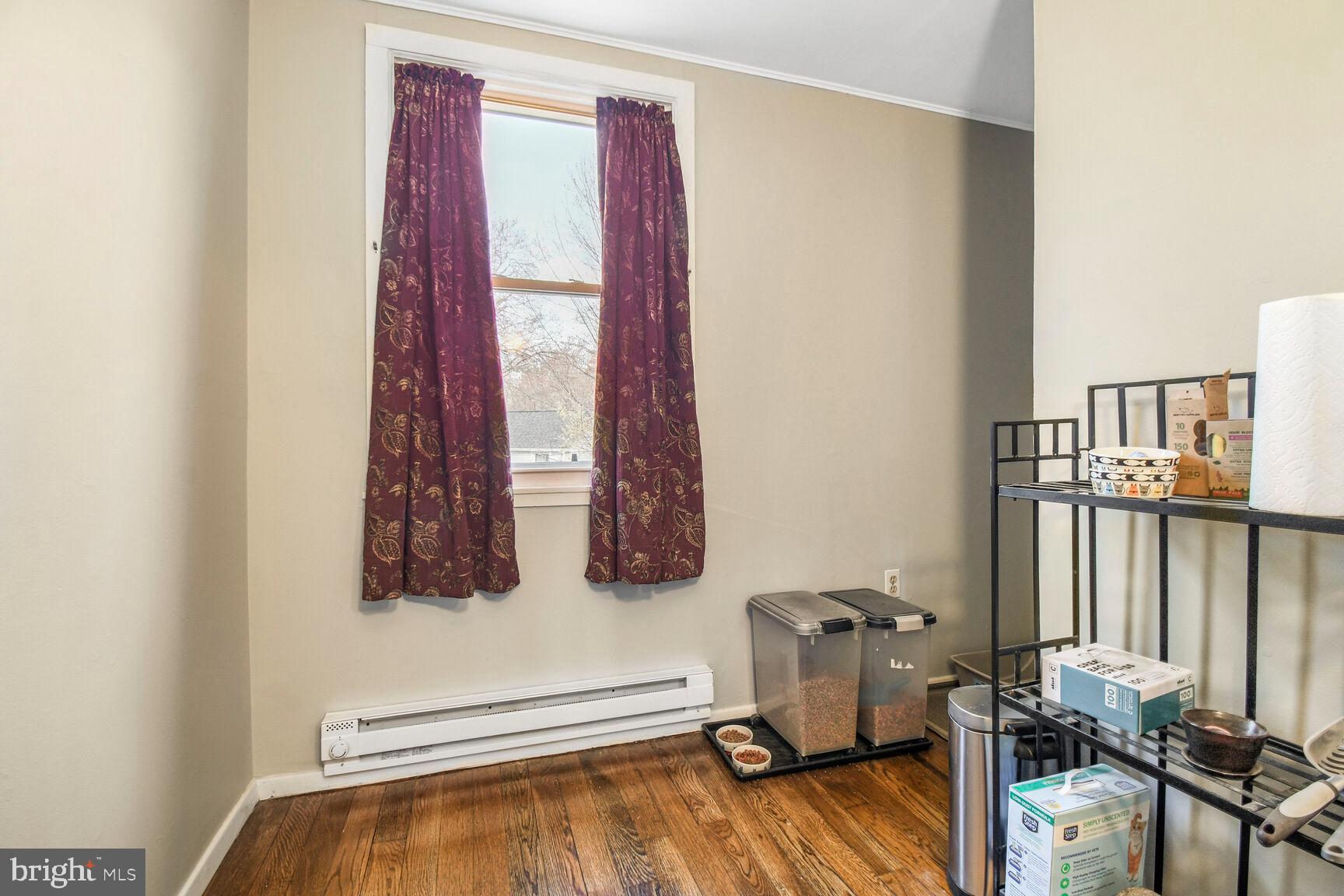 36 Ridge Road Greenbelt, MD 20770 - Photo 13 of 27 a room with furniture and a window