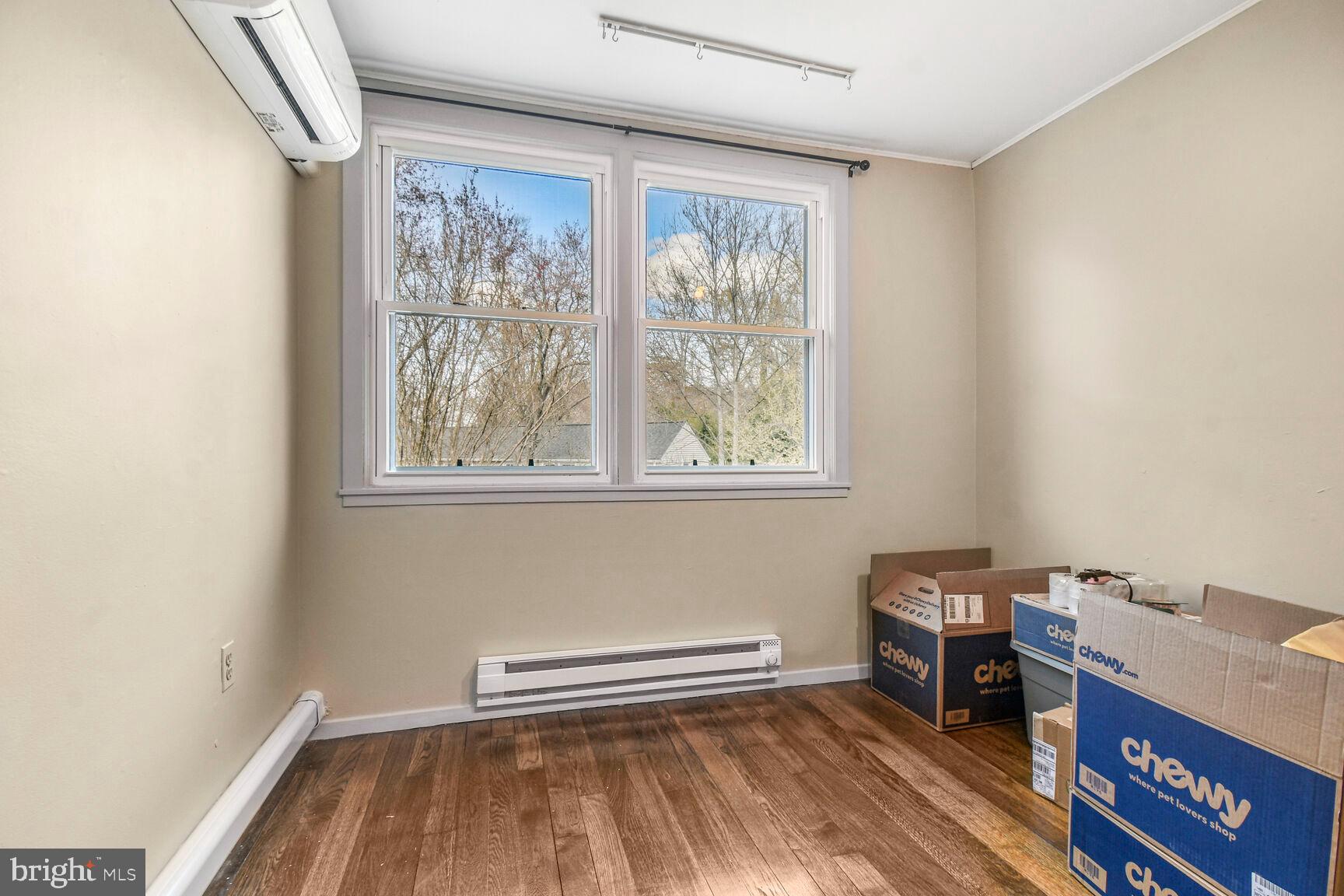 36 Ridge Road Greenbelt, MD 20770 - Photo 14 of 27 a view of room with window and wooden floor