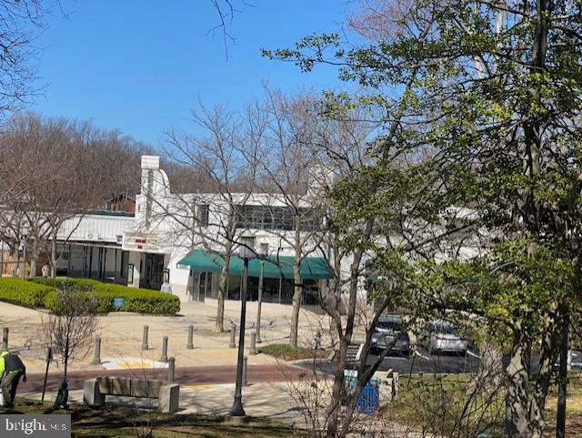 36 Ridge Road Greenbelt, MD 20770 - Photo 20 of 27 a view of a white house with a tree