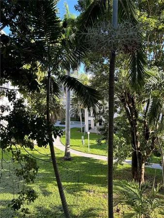a view of swimming pool from a garden