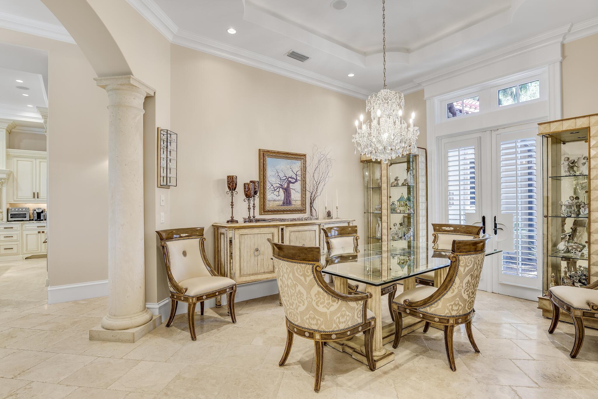 2902 Pine Valley Road Miramar Beach, FL 32550 - Photo 13 of 89 a view of a dining room with furniture and chandelier