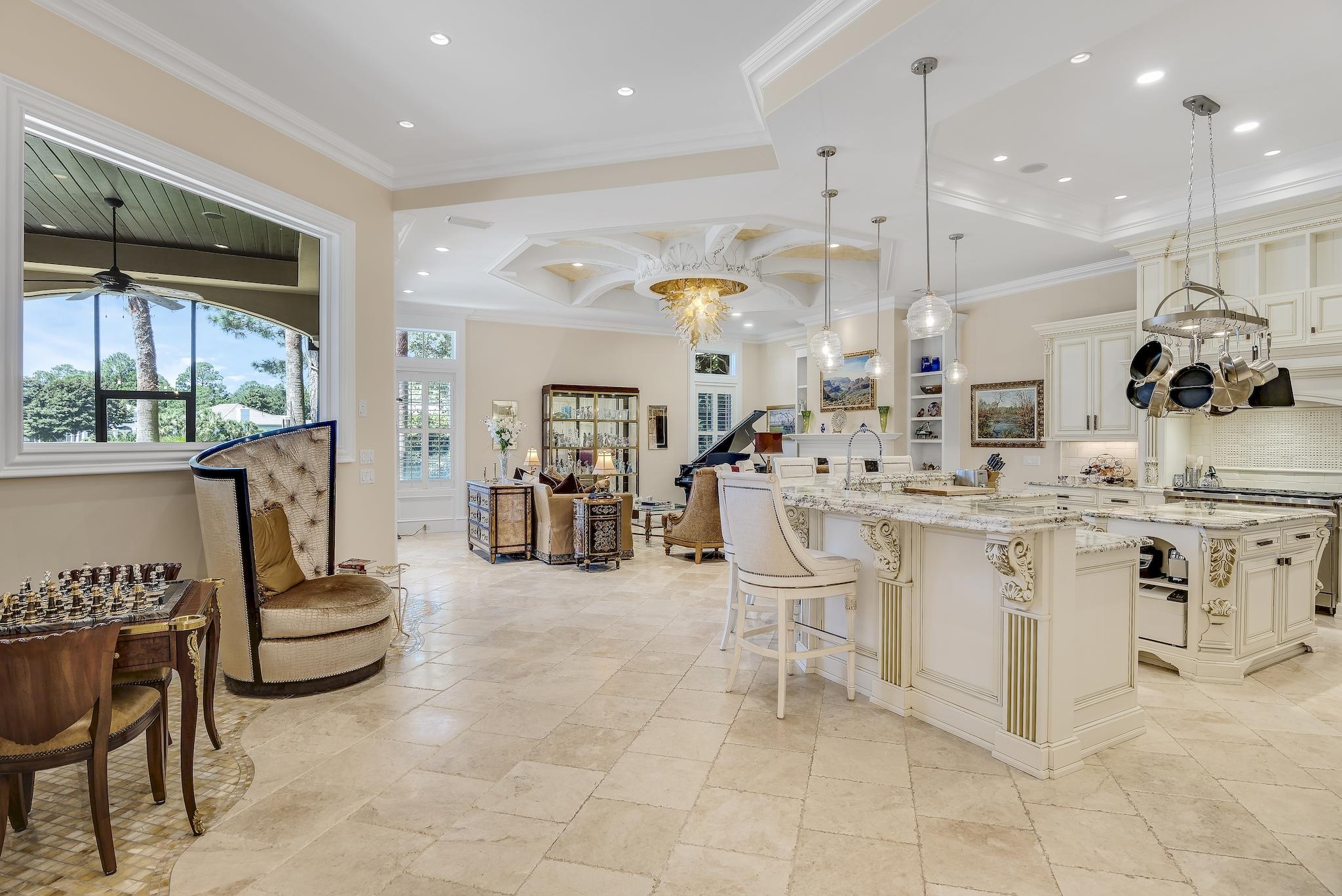 2902 Pine Valley Road Miramar Beach, FL 32550 - Photo 14 of 89 a large kitchen with a table and chairs