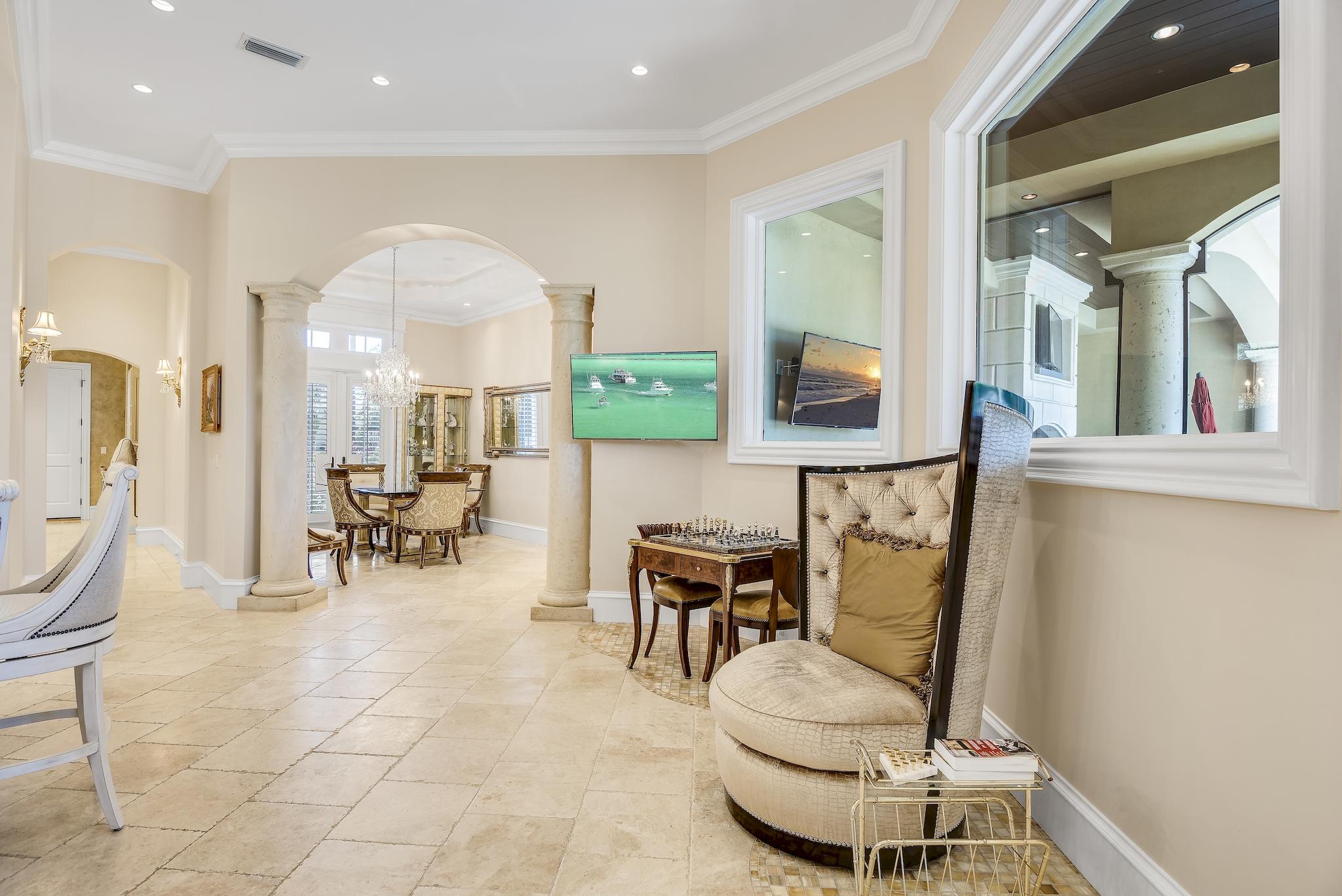 2902 Pine Valley Road Miramar Beach, FL 32550 - Photo 16 of 89 a living room with furniture and a painting on the wall