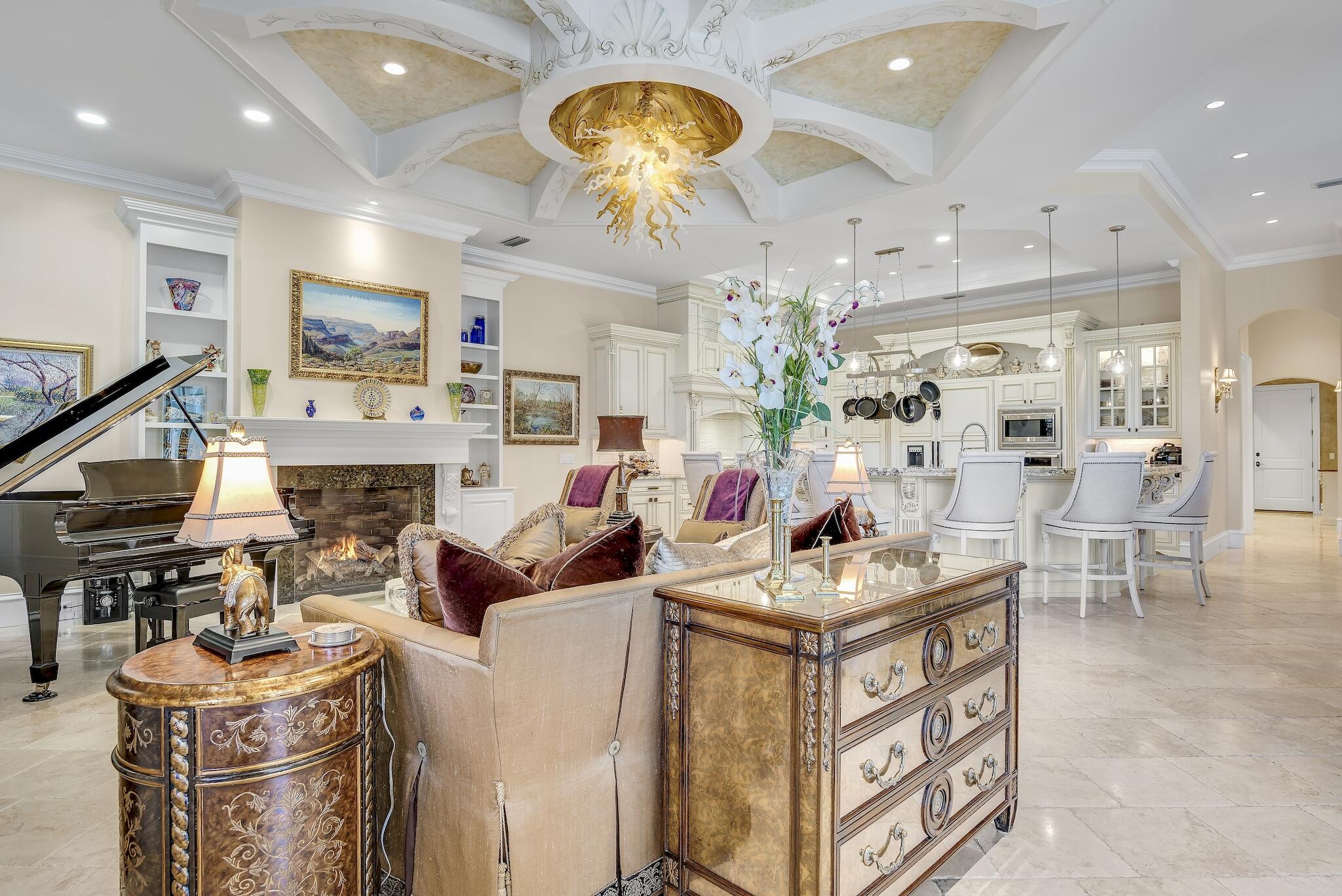 2902 Pine Valley Road Miramar Beach, FL 32550 - Photo 22 of 89 a living room with fireplace furniture and a chandelier