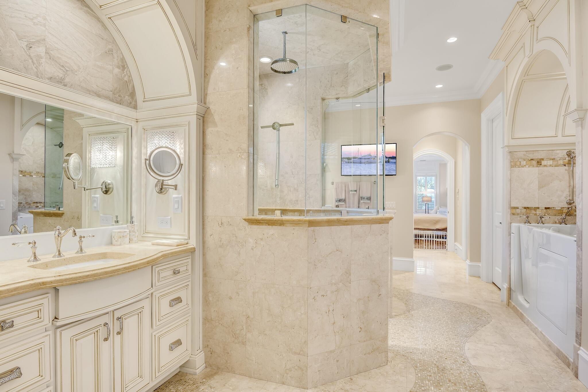 2902 Pine Valley Road Miramar Beach, FL 32550 - Photo 28 of 89 a bathroom with a sink a mirror and a shower