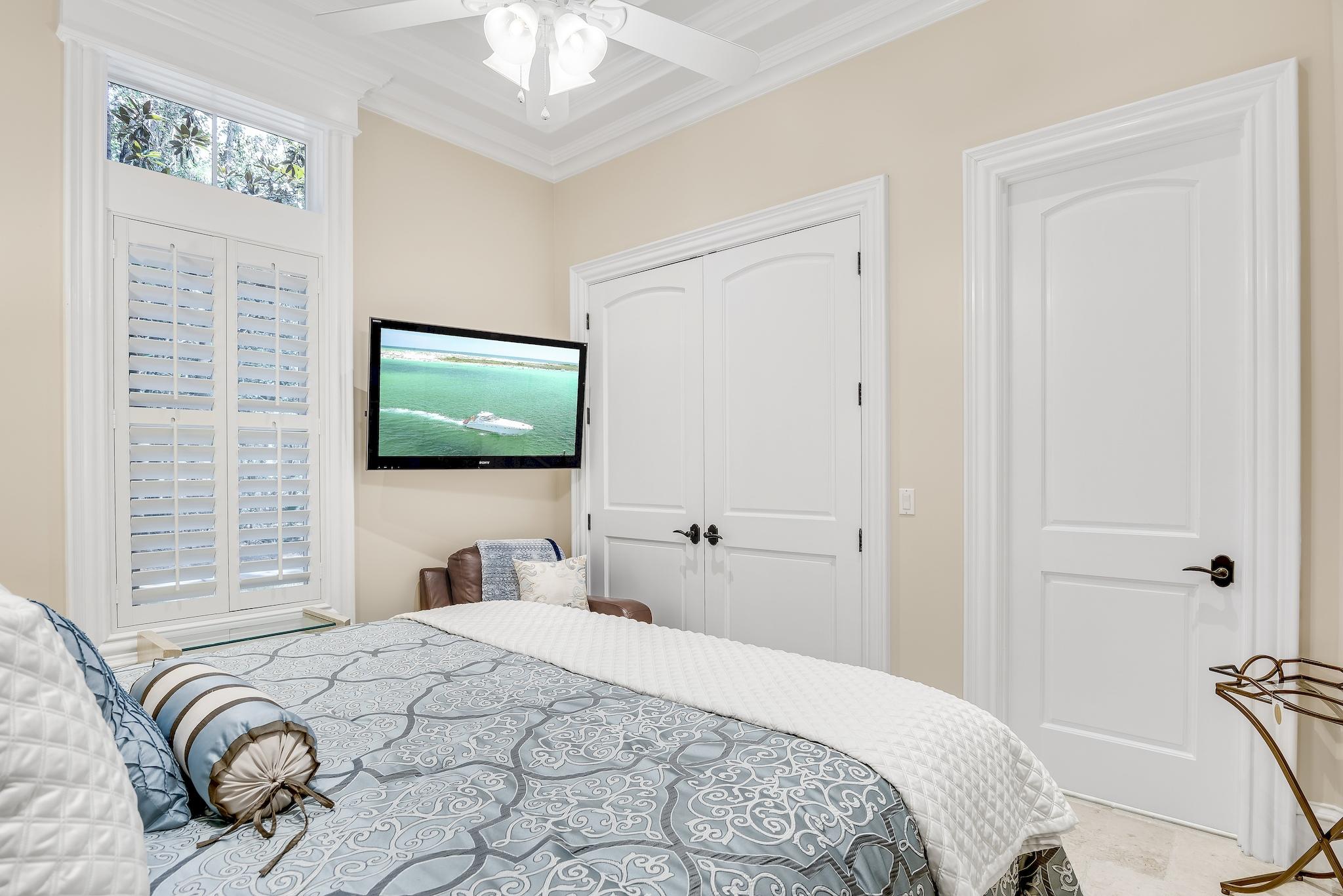 2902 Pine Valley Road Miramar Beach, FL 32550 - Photo 35 of 89 a bedroom with a bed and a flat screen tv