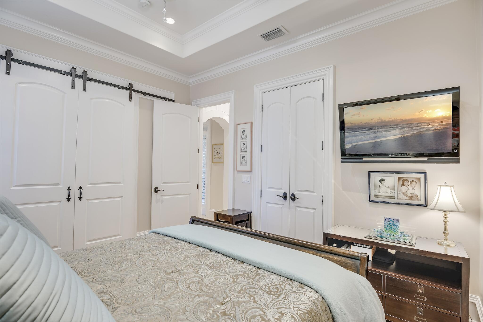 2902 Pine Valley Road Miramar Beach, FL 32550 - Photo 49 of 89 a bedroom with a bed and a flat screen tv