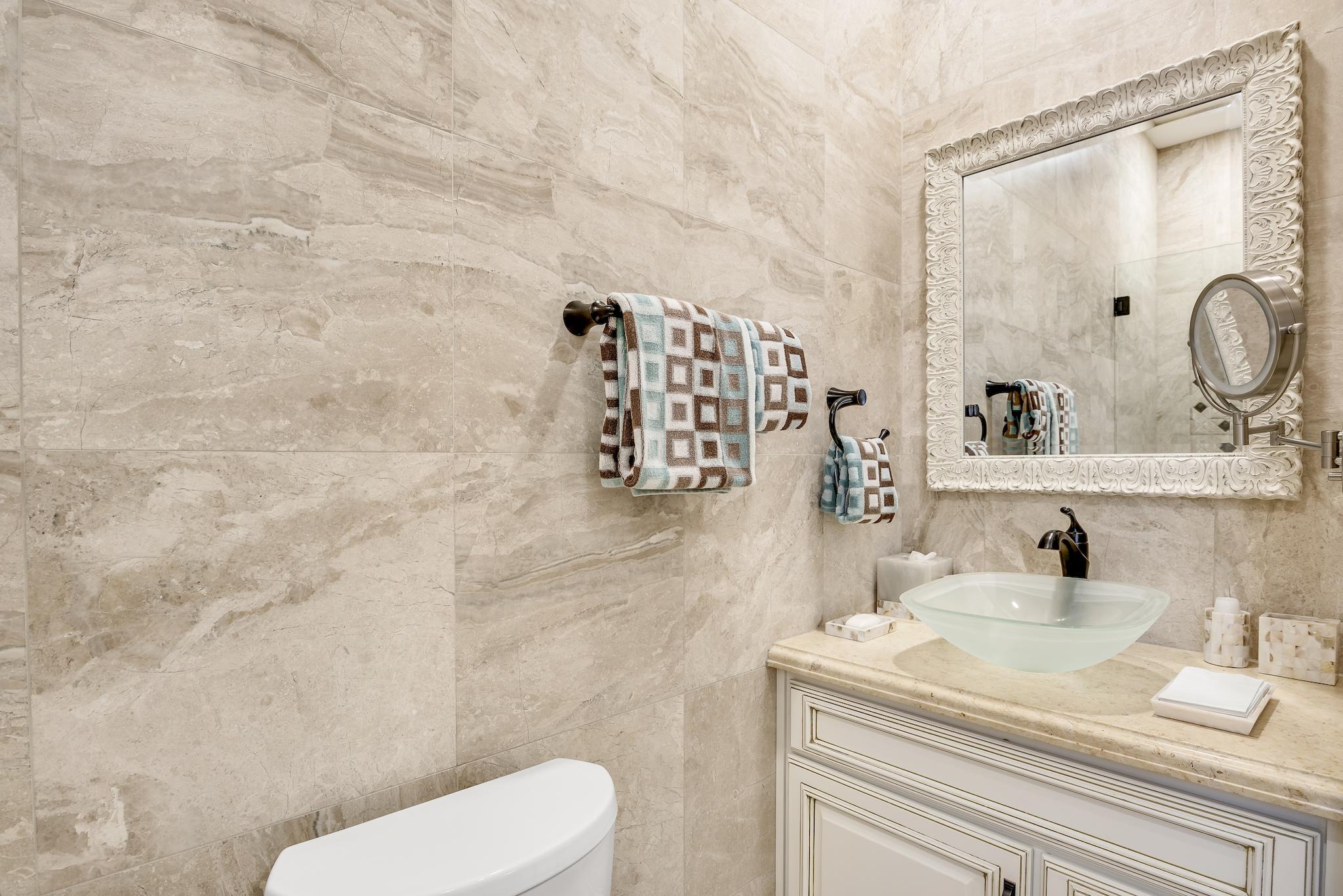 2902 Pine Valley Road Miramar Beach, FL 32550 - Photo 50 of 89 a bathroom with a sink a toilet and shower