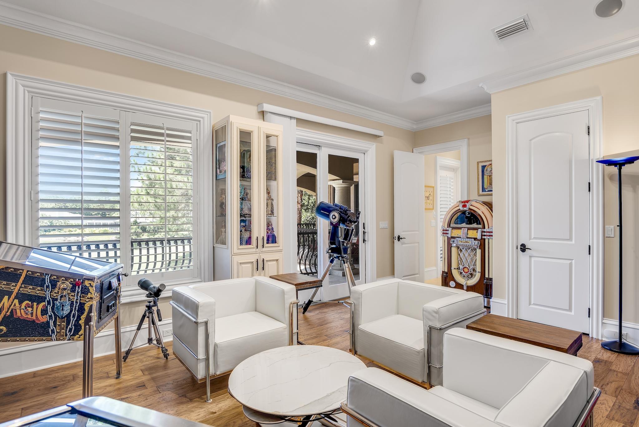 2902 Pine Valley Road Miramar Beach, FL 32550 - Photo 51 of 89 a living room with furniture and a large window