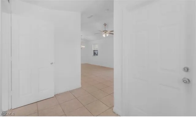 a bathroom with a granite countertop sink a toilet a shower and a mirror