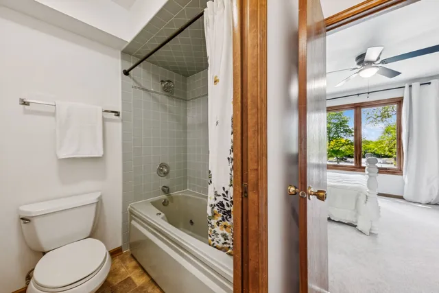a bathroom with a toilet a sink and a bathtub