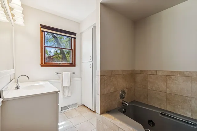 a bathroom with a sink and a bathtub