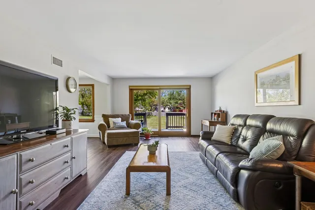 a living room with furniture or couch and a flat screen tv