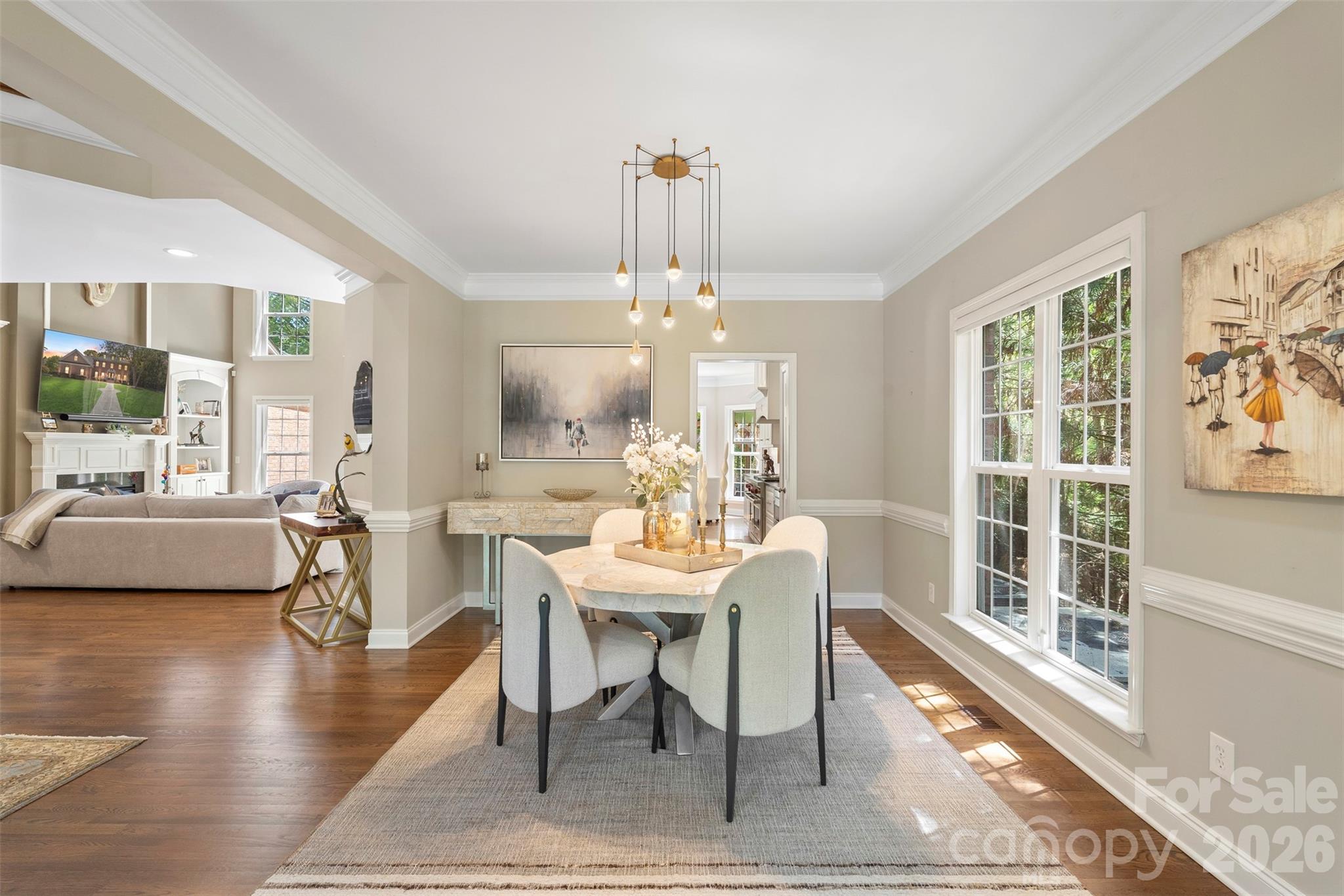 2003 Bauer Place Waxhaw, NC 28173 - Photo 11 of 47 a view of a dining room with furniture window and wooden floor