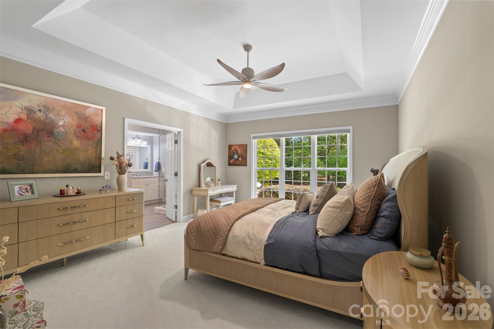 2003 Bauer Place Waxhaw, NC 28173 - Photo 23 of 47 a spacious bedroom with a bed and a flat screen tv