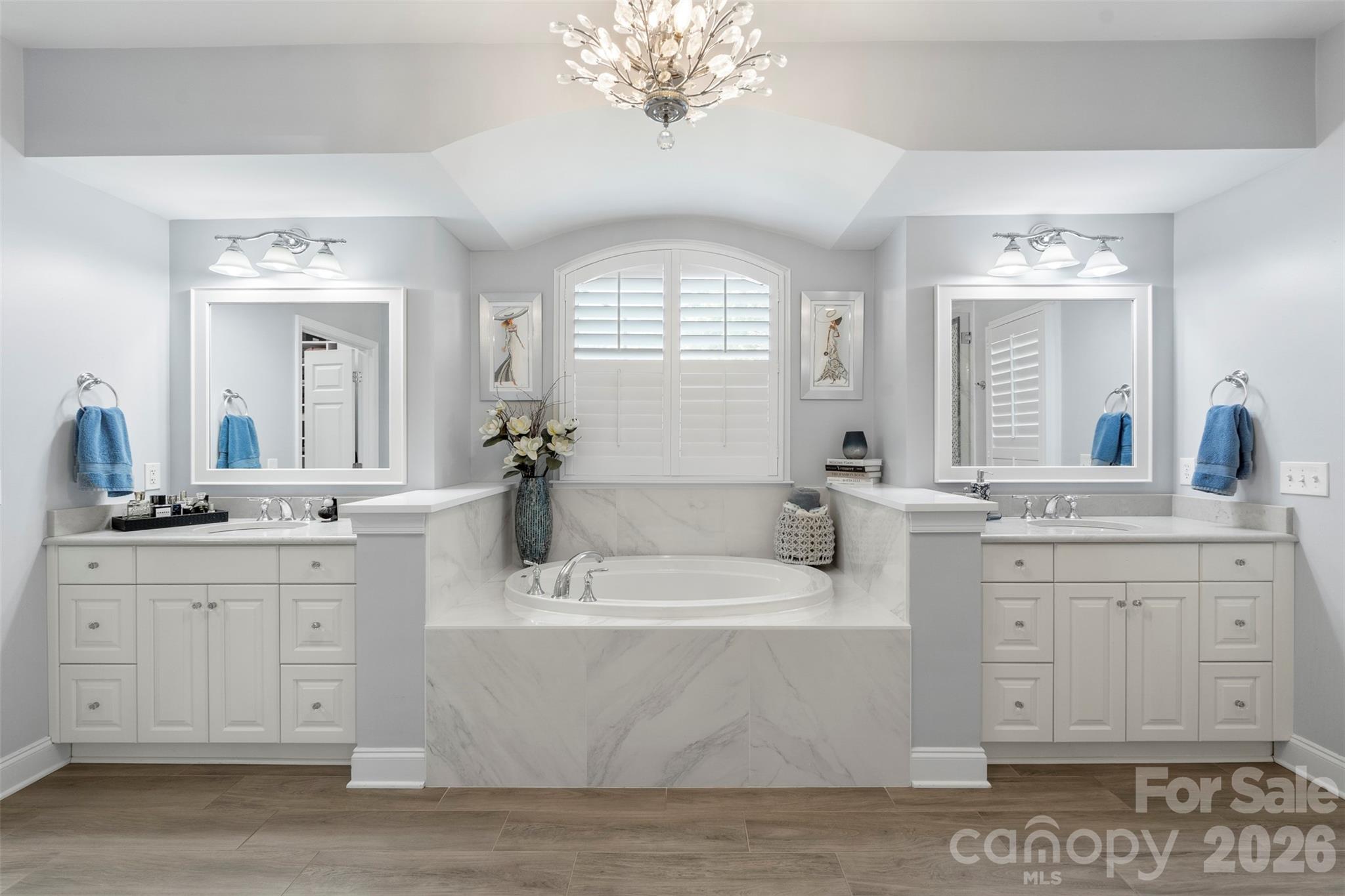 2003 Bauer Place Waxhaw, NC 28173 - Photo 25 of 47 a spacious bathroom with sinks mirror and a bathtub