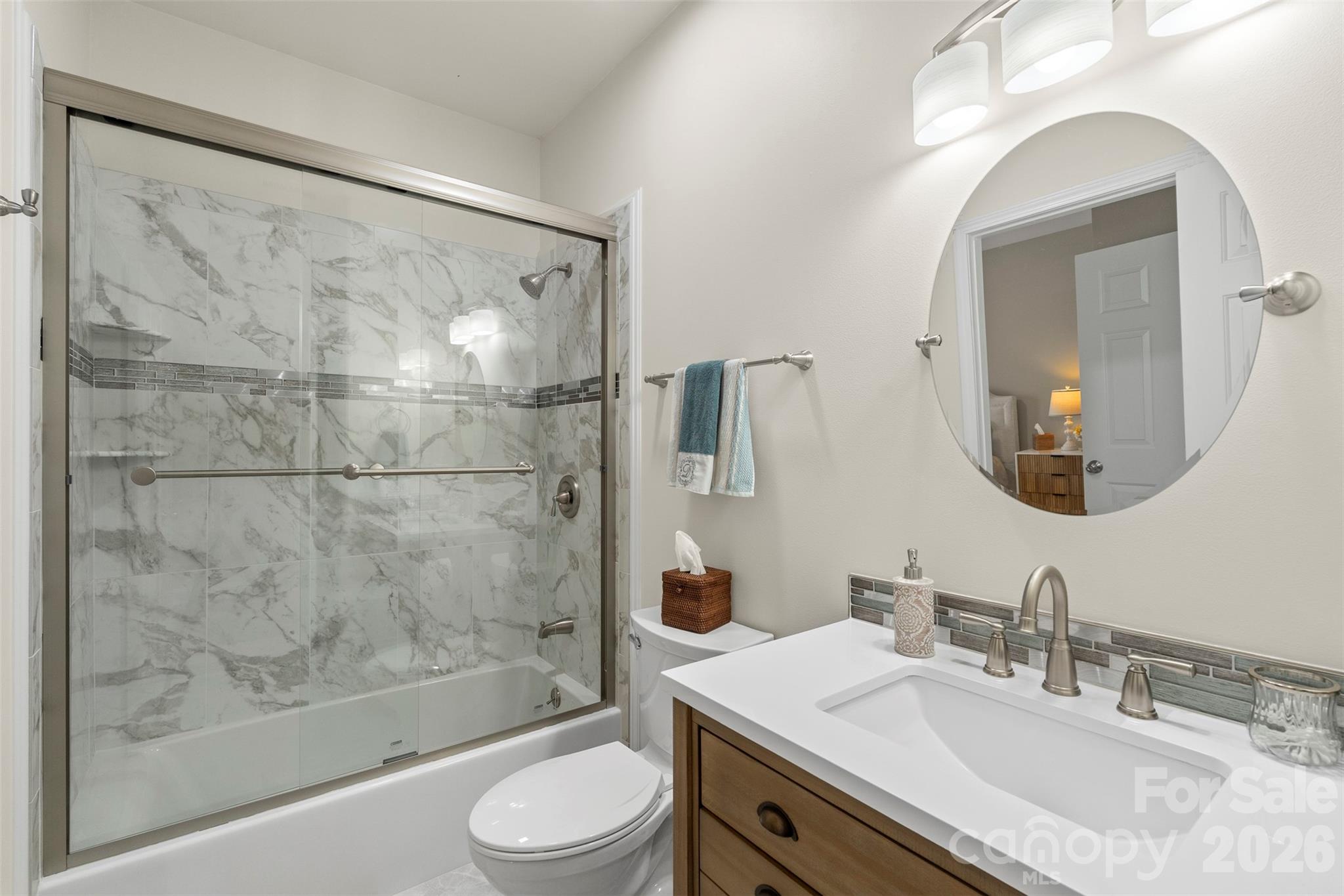 2003 Bauer Place Waxhaw, NC 28173 - Photo 32 of 47 a bathroom with a bathtub shower sink vanity and toilet