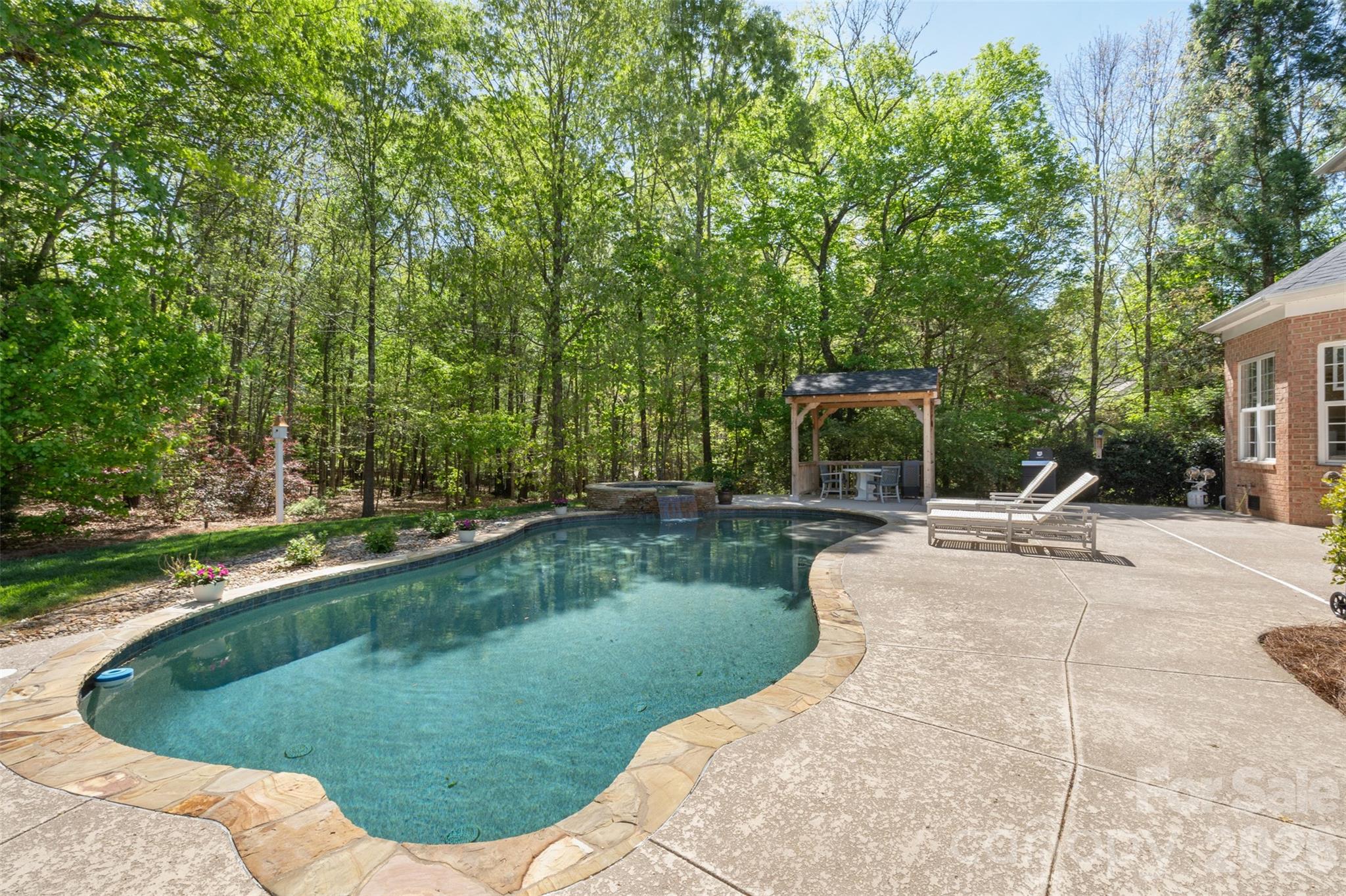 2003 Bauer Place Waxhaw, NC 28173 - Photo 39 of 47 a view of a backyard with sitting area