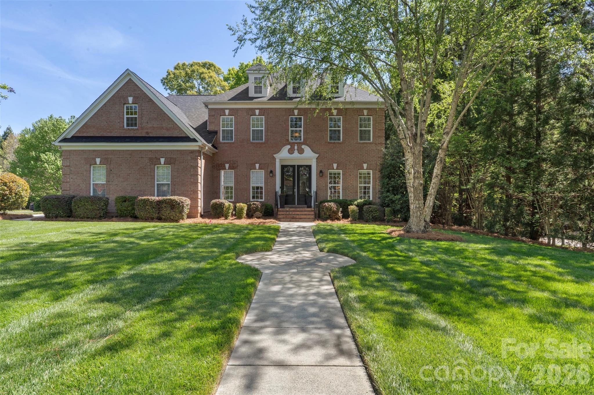 2003 Bauer Place Waxhaw, NC 28173 - Photo 6 of 47 front view of a house with a yard