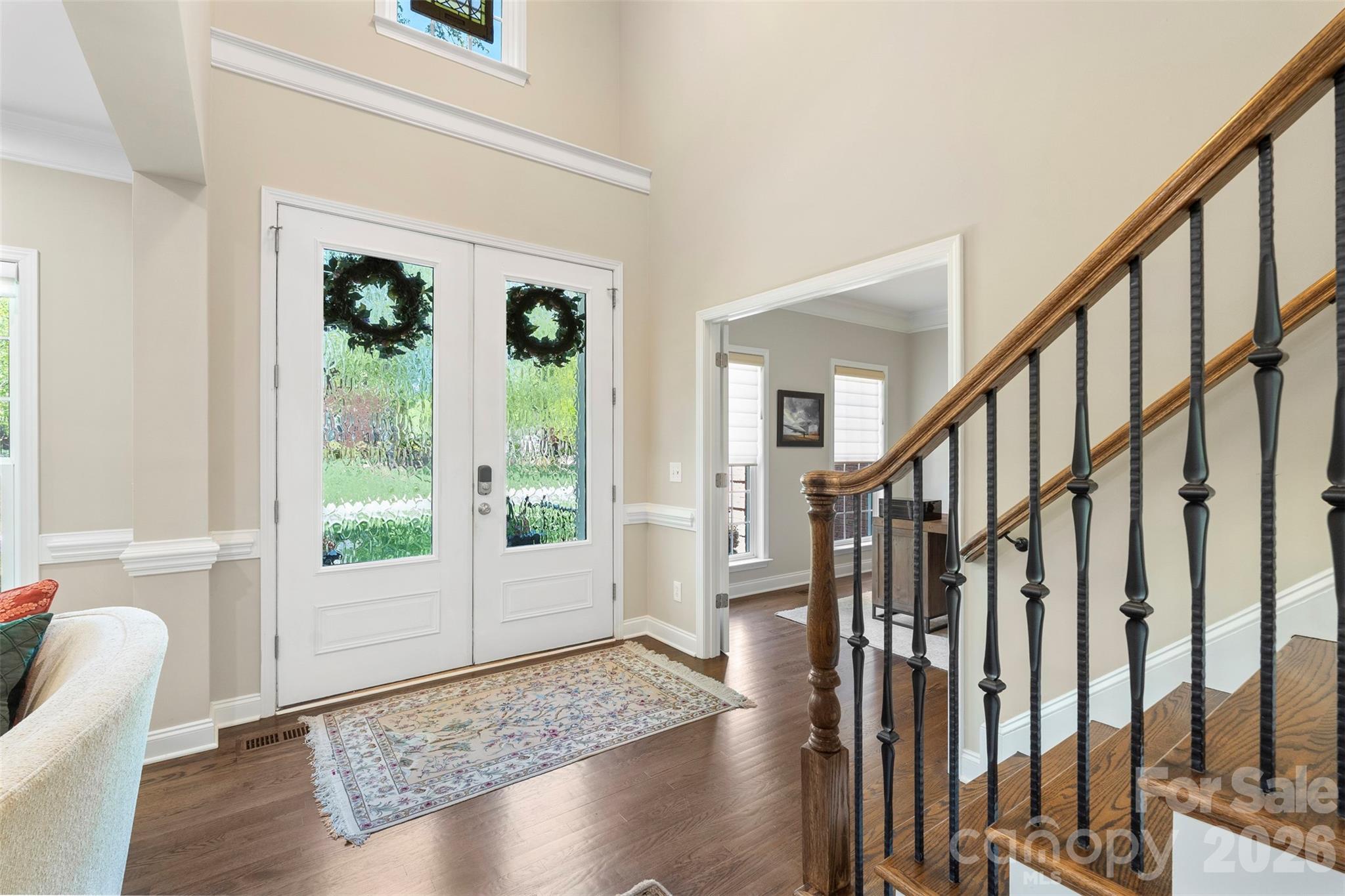 2003 Bauer Place Waxhaw, NC 28173 - Photo 7 of 47 a view of an entryway with wooden floor and door