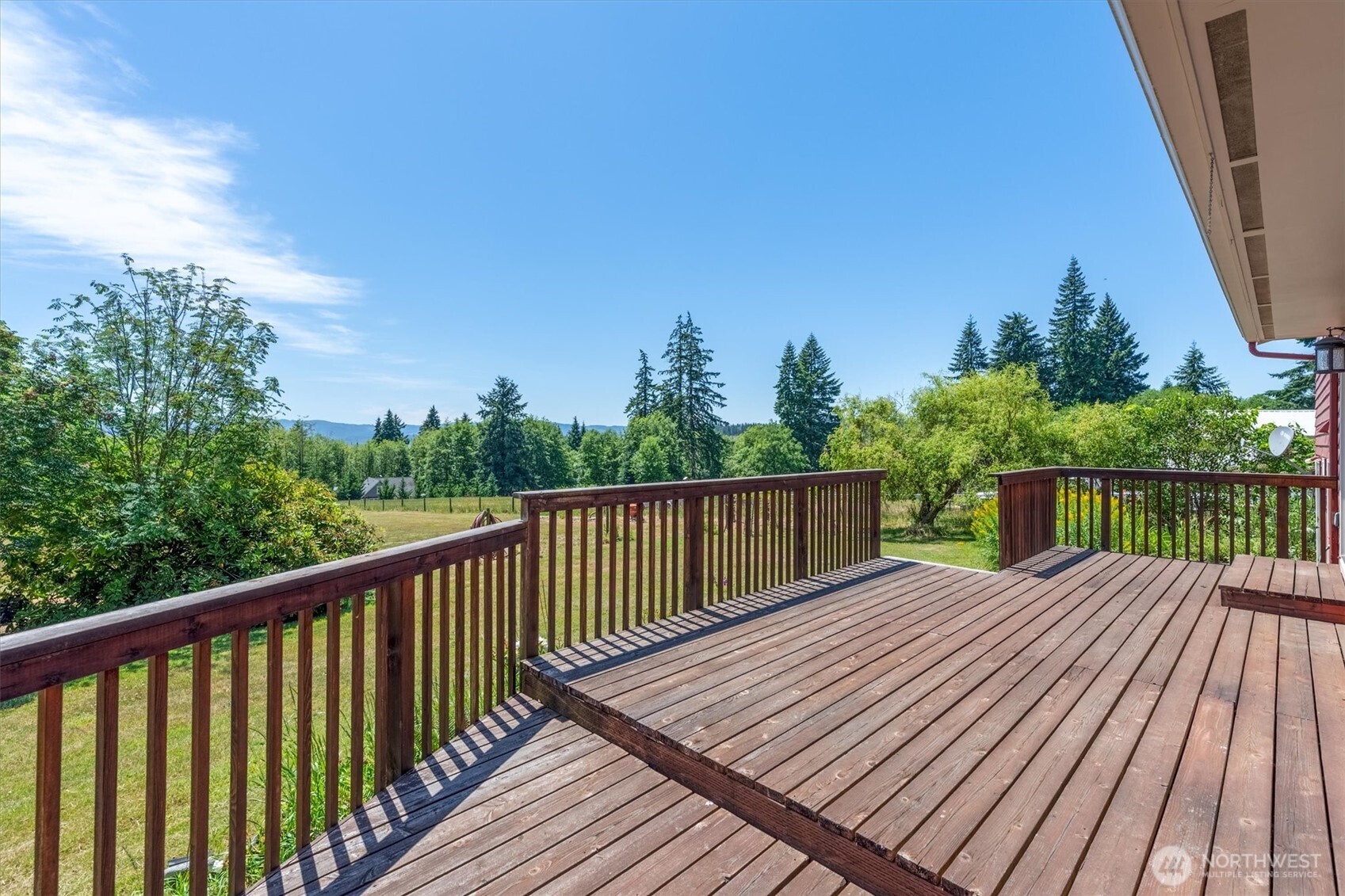 231 Robertson Road Longview, WA 98632 - Photo 27 of 37 a balcony with wooden floor and fence