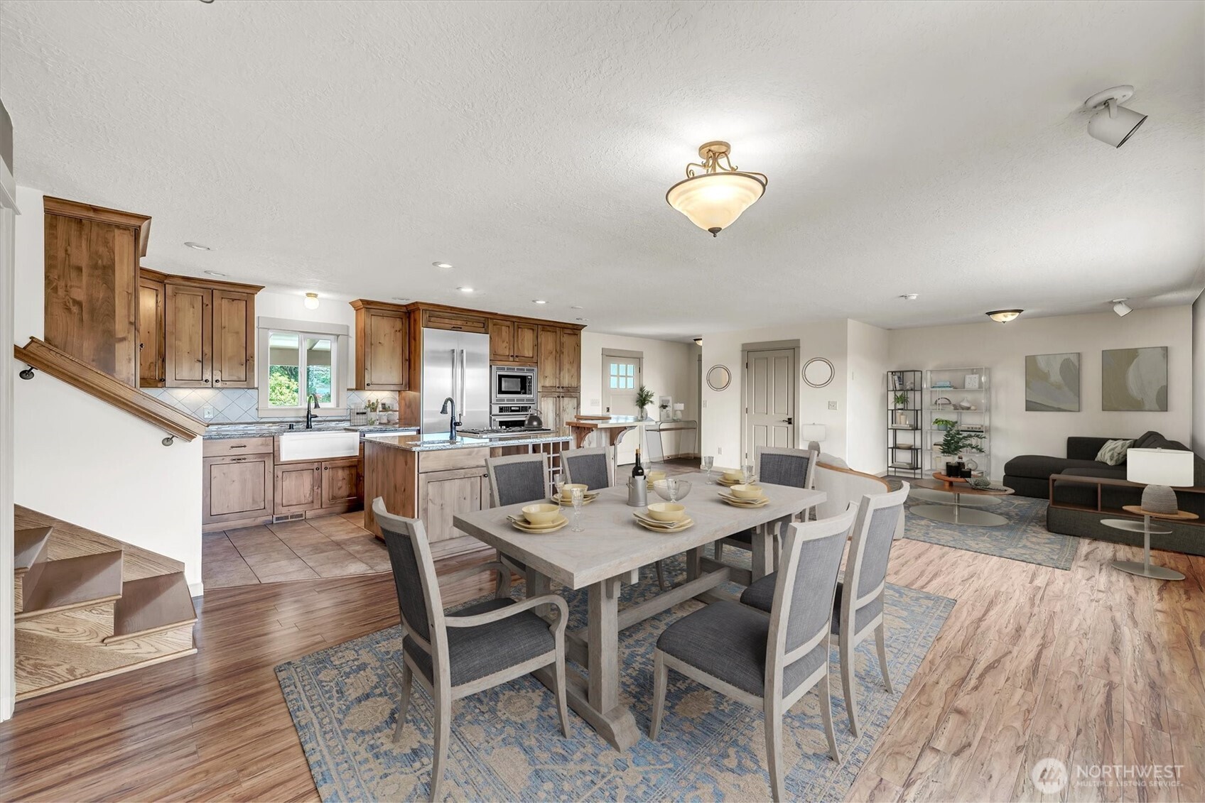 231 Robertson Road Longview, WA 98632 - Photo 10 of 37 a view of a dining room with furniture and wooden floor